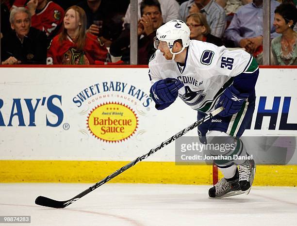 Jannik Hansen of the Vancouver Canucks skates up the ice against the Chicago Blackhawks in Game Two of the Western Conference Semifinals during the...