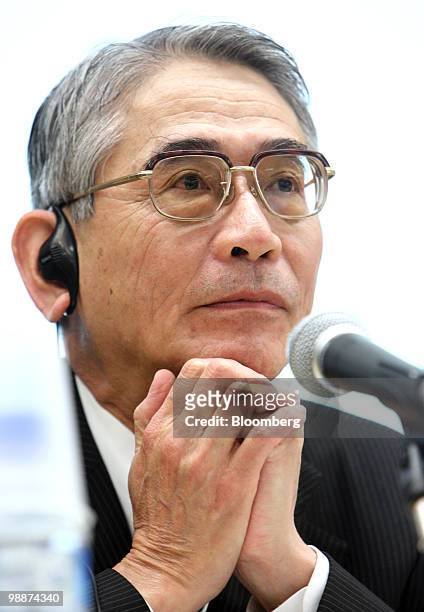 Fumiyuki Akikusa, president and chief executive officer of Mitsubishi UFJ Morgan Stanley Securities Co., listens during a news conference in Tokyo,...