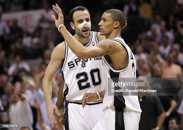 Manu Ginobili and George Hill of the San Antonio Spurs in Game Six of the Western Conference Quarterfinals during the 2010 NBA Playoffs at AT&T...