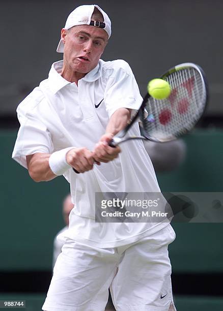 Lleyton Hewitt of Australia in action against Younes El Aynaoui of Morocco during the men's third round of The All England Lawn Tennis Championship...
