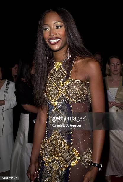 Naomi Campbell wearing diamond drop earrings and diamond ring at A Diamond is Forever: Cinema Against AIDS gala to benefit amfAR at the Cannes Film...