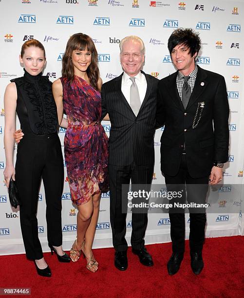 Models Cerri McQuillan, Kalyn Hemphill, Tim Gunn and Seth Aaron Henderson attend the 2010 A&E Upfront at the IAC Building on May 5, 2010 in New York...