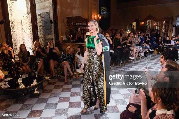 Uma Thurman walks the runway during Miu Miu 2019 Cruise Collection Show at Hotel Regina on June 30, 2018 in Paris, France.