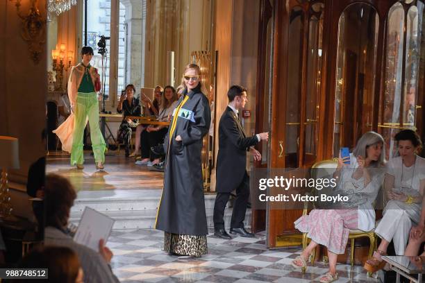 Uma Thurman walks the runway during Miu Miu 2019 Cruise Collection Show at Hotel Regina on June 30, 2018 in Paris, France.