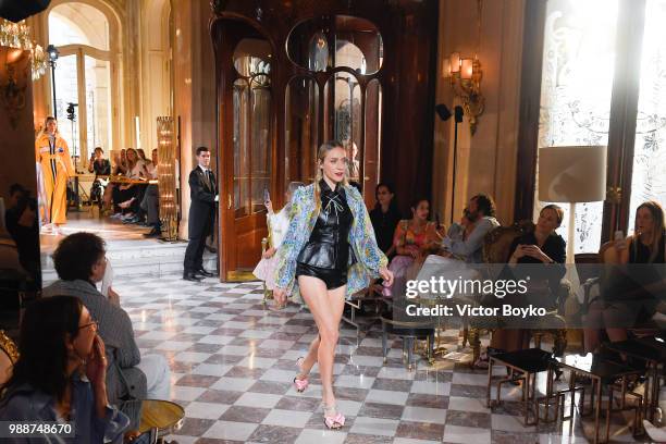 Chloe Sevigny walks the runway during Miu Miu 2019 Cruise Collection Show at Hotel Regina on June 30, 2018 in Paris, France.