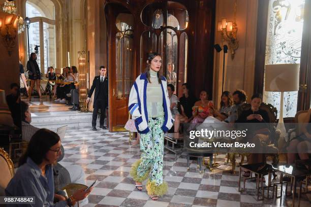 Alexa Chung walks the runway during Miu Miu 2019 Cruise Collection Show at Hotel Regina on June 30, 2018 in Paris, France.