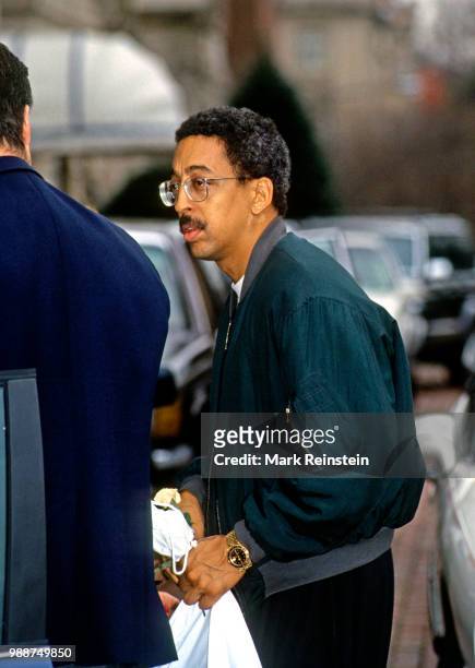 Gregory Hines stops to take pictures and sign autographs for fans outside the Jockey Club prior to the annual brunch for the Kennedy Center Honorees,...