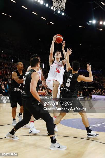 Abudushalamu Abudurexiti of China goes to the basket during the FIBA World Cup Qualifying match between the New Zealand Tall Blacks and China at...