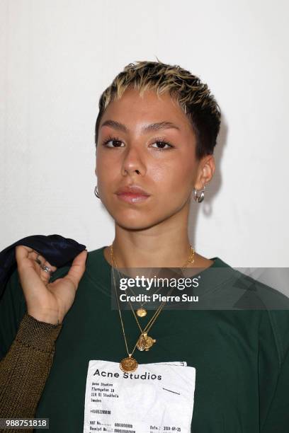 Singer Poppy Ajudha attends the Acne Studios : Front Row - Paris Fashion Week - Womenswear Spring Summer 2019 show part of Paris Fashion Week on July...