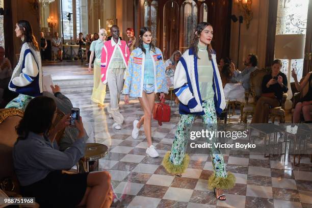 Alexa Chung walks the runway during the finale of the Miu Miu 2019 Cruise Collection Show at Hotel Regina on June 30, 2018 in Paris, France.