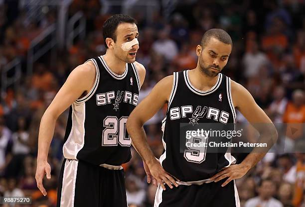 Manu Ginobili of the San Antonio Spurs reacts to teammate Tony Parker during Game Two of the Western Conference Semifinals of the 2010 NBA Playoffs...