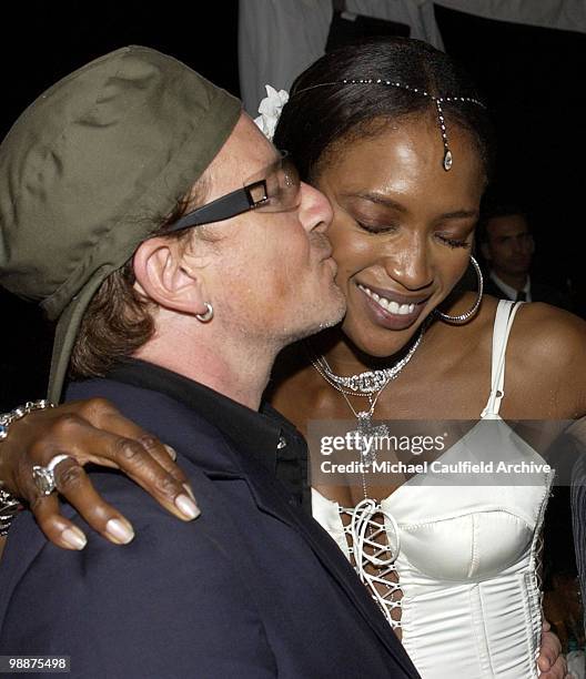 Bono kisses Naomi Campbell during the Vincent Longo 5th Anniversary event benefiting amfAR and Sabera, co-hosted by Trudie Styler and Vincent Longo...
