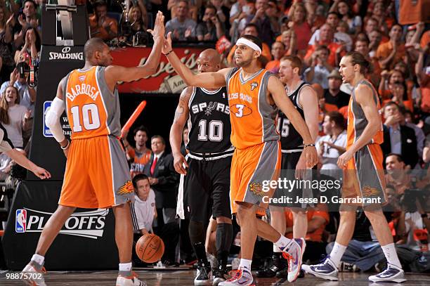 Jared Dudley and Leandro Barbosa of the Phoenix Suns celebrate against the San Antonio Spurs in Game Two of the Western Conference Semifinals during...