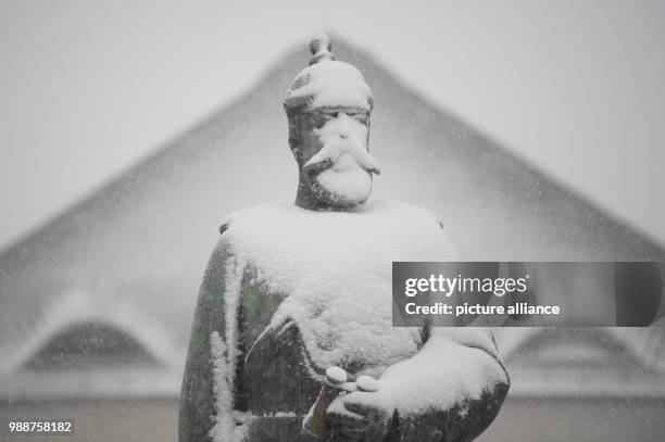 The statue of Louis IV, Grand Duke of Hesse and by Rhine, covered with a layer of snow in Bingen, Germany, 10 December 2017. Heavy snow fall is...