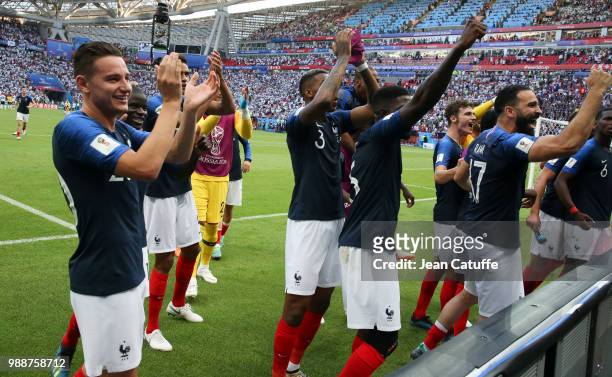 Florian Thauvin, Adil Rami and teammates of France celebrate the victory following the 2018 FIFA World Cup Russia Round of 16 match between France...
