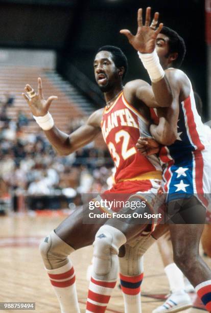 Dan Roundfield of the Atlanta Hawks battles for position against the New Jersey Nets during an NBA basketball game circa 1979 at the Rutgers Athletic...