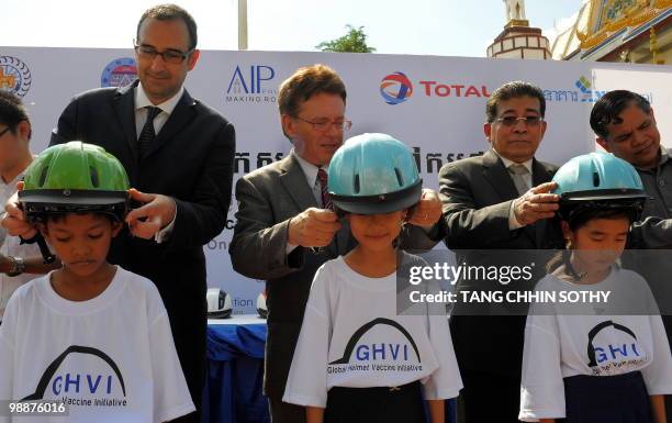 Cambodian Minister of Education Im Sithy , Greig Craft , CEO of Globle Helmet Vaccine Initiative and president of Asia Injury Prevention foundation...