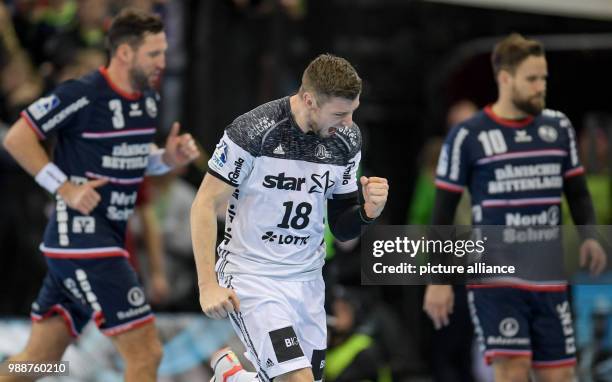 Kiel's Niclas Ekberg celebrating a goal during the German Bundesliga handball match between SG Flensburg-Handewitt and THW Kiel in the Flens Arena in...