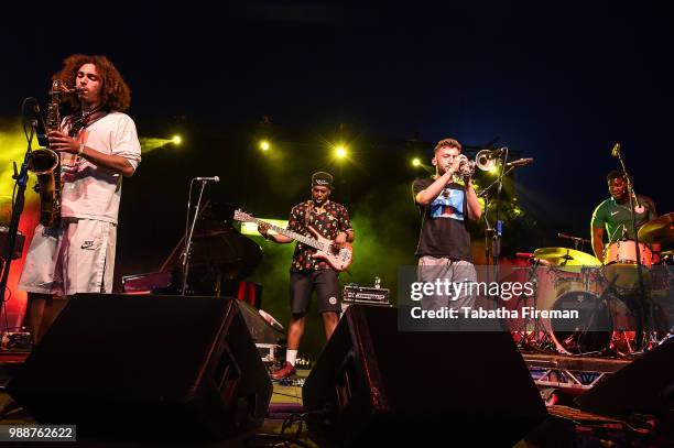 James Mollison,TJ Koleoso, Dylan Jones and Femi Koleoso of Ezra Collective perform on the Arena Stage on day 2 of Love Supreme Festival on June 30,...