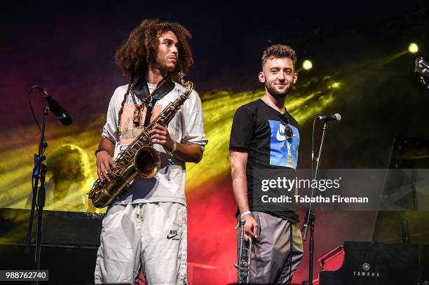 James Mollison and Dylan Jones of Ezra Collective perform on the Arena stage on Day 2 of Love Supreme Festival on June 30, 2018 in Brighton, England.