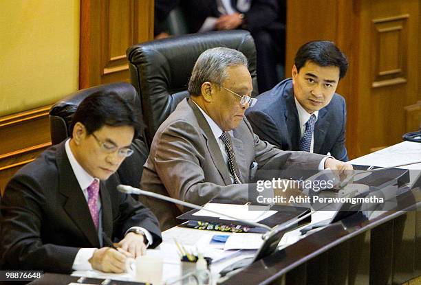 Thai Prime Minister Abhisit Vejjajiva looks toward to a camera during a parliamentary session at Parliament on May 6, 2010 in Bangkok, Thailand....