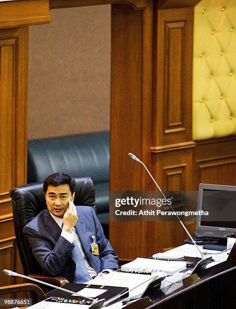 Thai Prime Minister Abhisit Vejjajiva speaks during a parliamentary session at Parliament on May 6, 2010 in Bangkok, Thailand. Prime Minister Abhisit...