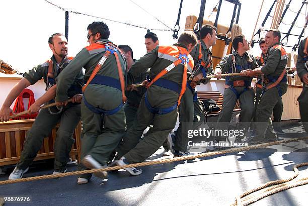 Sailors of Italian Navy aboard the Italian Navy Training Ship Palinuro shall maneuver to hoist the sails during the Naval Academy Trophy on April 30,...