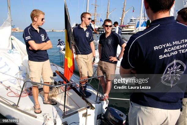 British cadet of the Royal Military Academy talks with Belgian academy cadets on their J 24 boat before races during the Naval Academy Trophy on...