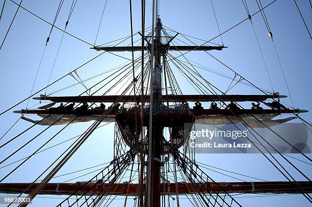 Sailors of the Italian Navy standing on the shaft of the vessel of the Italian Navy Training Ship Palinuro during the Naval Academy Trophy on April...