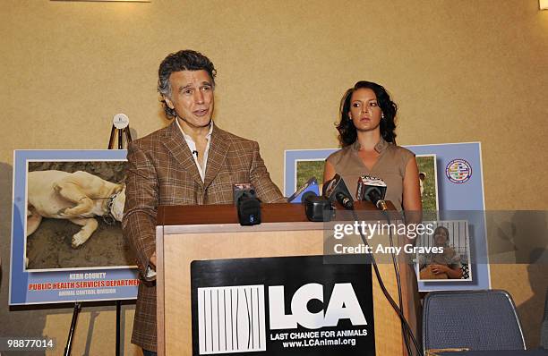 President of LCA Chris DeRose addresses the audience as actress Katherine Heigl looks on at the Last Chance for Animals and The Jason Debus Heigl...