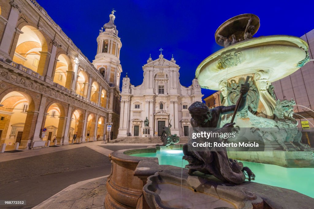 Night view of the Basilica of the Holy House and fountain decorated with statues, Loreto, Province of Ancona, Marche, Italy, Europe