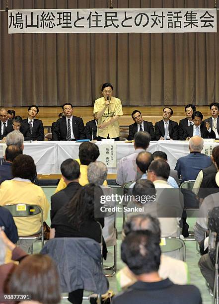 Japanese Prime Minister Yukio Hatoyama speaks during the dialogue meeting with residents at Futenma Daini Elementary School on May 4, 2010 in...