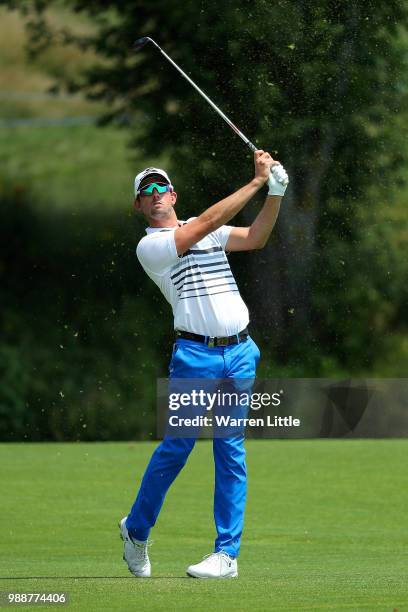 Alexander Bjork of Sweden plays his second shot on the 1st hole during day four of the HNA Open de France at Le Golf National on July 1, 2018 in...