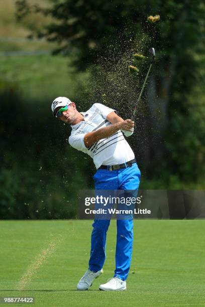 Alexander Bjork of Sweden plays his second shot on the 1st hole during day four of the HNA Open de France at Le Golf National on July 1, 2018 in...