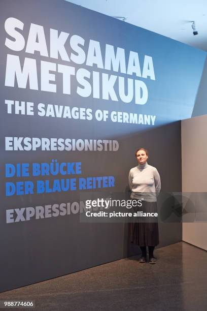 Curator Liis Paehlapuu stands in the entrance area of the exhibition 'The Savages of Germany. Die Bruecke and Der Blaue Reiter Expressionists' at the...