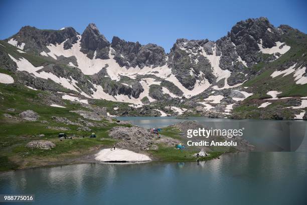 Athletes are seen near Glacier Lake Sat at Mountains Cilo during the 1st Nature Sports Festival in Hakkari, Turkey on July 01, 2018. Mountains Cilo...
