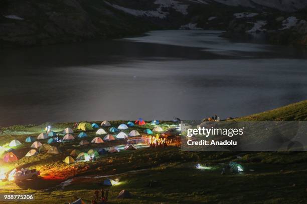 Athletes' tents are seen near Glacier Lake Sat at Mountains Cilo during the 1st Nature Sports Festival in Hakkari, Turkey on July 01, 2018. Mountains...