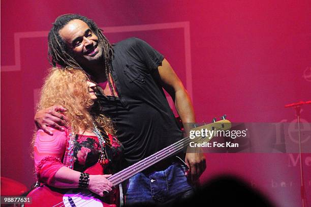 Singer/former tennis player Yannick Noah and singer/guitarist "Tatat" from the "Cochons dans l'Espace" band perform during the "Reservoir Bleu...