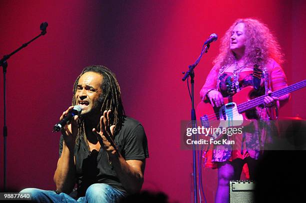 Singer/former tennis player Yannick Noah and singer/guitarist "Tatat" from the "Cochons dans l'Espace" band perform during the "Reservoir Bleu...