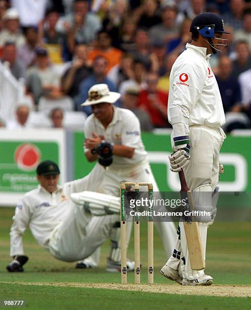 Dejected Marcus Trescothick of England as wicketkeepr Adam Gilchristof Australia catches him behind off the bowling of Jason Gillespie during the...