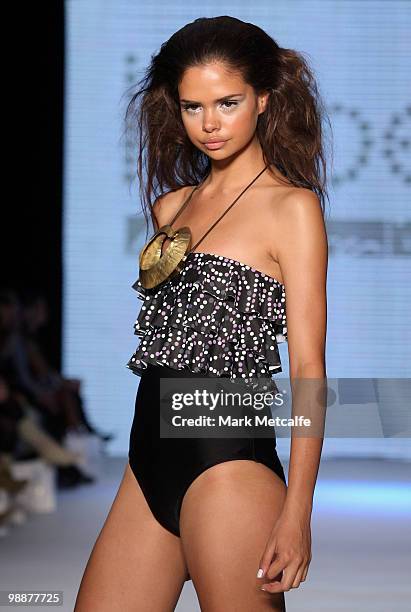 Model Samantha Harris showcases designs on the catwalk during the Kooey collection show on the fourth day of Rosemount Australian Fashion Week...