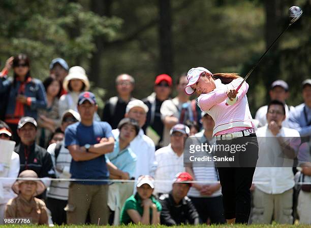 Chie Arimura of Japan hits a tee shot on the 8th hole during the final round of the CyberAgent Ladies Golf Tournament at Tsurumai Country Club on May...