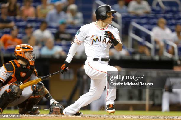 Derek Dietrich of the Miami Marlins in action against the San Francisco Giants at Marlins Park on June 14, 2018 in Miami, Florida.