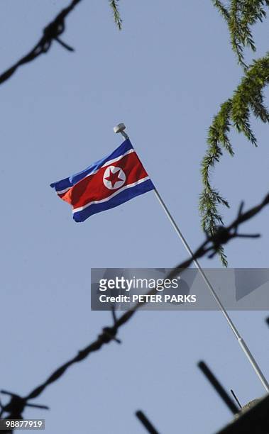 The North Korean flag flies over its embassy in Beijing on May 6, 2010. North Korea's leader Kim Jong-Il is reportedly in Beijing and has told...