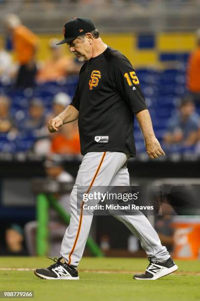 Manager Bruce Bochy of the San Francisco Giants looks on at Marlins Park on June 14, 2018 in Miami, Florida.