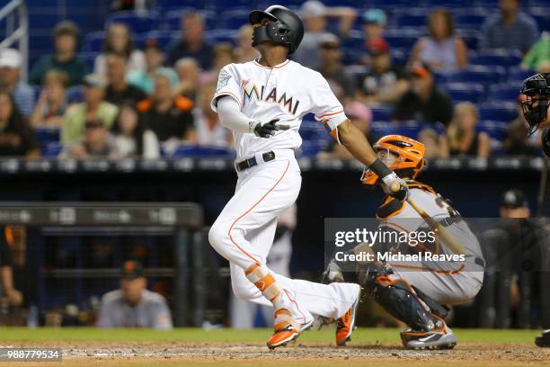 Lewis Brinson of the Miami Marlins in action against the San Francisco Giants at Marlins Park on June 14, 2018 in Miami, Florida.