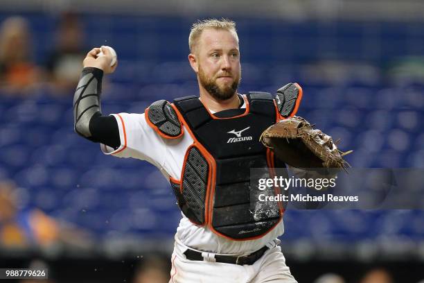 Bryan Holaday of the Miami Marlins in action against the San Francisco Giants at Marlins Park on June 14, 2018 in Miami, Florida.