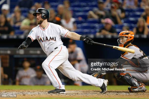 Bryan Holaday of the Miami Marlins in action against the San Francisco Giants at Marlins Park on June 14, 2018 in Miami, Florida.