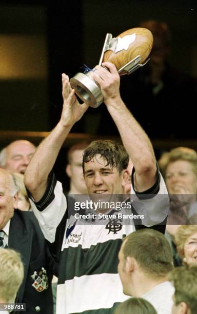 Barbarian captain Gary Teichmann lifts the trophy after winning the match against England played at Twickenham, London. Mandatory Credit: Steve...