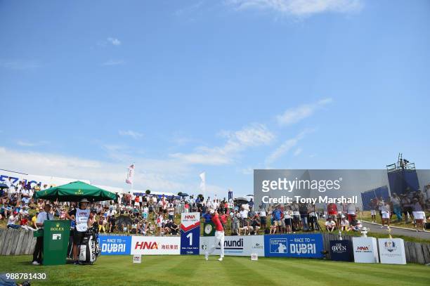 Chris Wood of England plays his first shot on the 1st tee during final round of the HNA Open de France at Le Golf National on July 1, 2018 in Paris,...